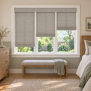 Custom Orelle 3 Shades on 1 Headrail Bamboo Shades - Mist Gray 103-22 - 3 independently raised panels in a bedroom
