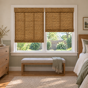 Custom Orelle 2 Shades on 1 Headrail Bamboo Shades - Amber - 2 independently raised panels in a bedroom