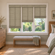 Custom Auvia 3 Shades on 1 Headrail Bamboo Shades - Hemp Grass - 3 independently raised panels in a bedroom