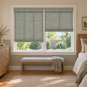 Custom Auvia 2 Shades on 1 Headrail Bamboo Shades - Grayish Blue - 2 independently raised panels in a bedroom