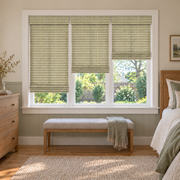 Custom Auvia 3 Shades on 1 Headrail Bamboo Shades - Avocado - 3 independently raised panels in a bedroom