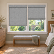 Custom Auvia 2 Shades on 1 Headrail Bamboo Shades - Cobblestone - 2 independently raised panels in a bedroom
