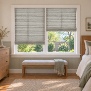 Custom Natural 2 Shades on 1 Headrail Bamboo Shades - Natural Sesame Gray - 2 independently raised panels in a bedroom