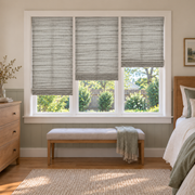 Custom Natural 3 Shades on 1 Headrail Bamboo Shades - Natural Sesame Gray - 3 independently raised panels in a bedroom