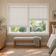 Custom Orelle 2 Shades on 1 Headrail Bamboo Shades - Off White - 2 independently raised panels in a bedroom