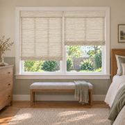 Custom Velune 2 Shades on 1 Headrail Bamboo Shades - Cream - 2 independently raised panels in a bedroom