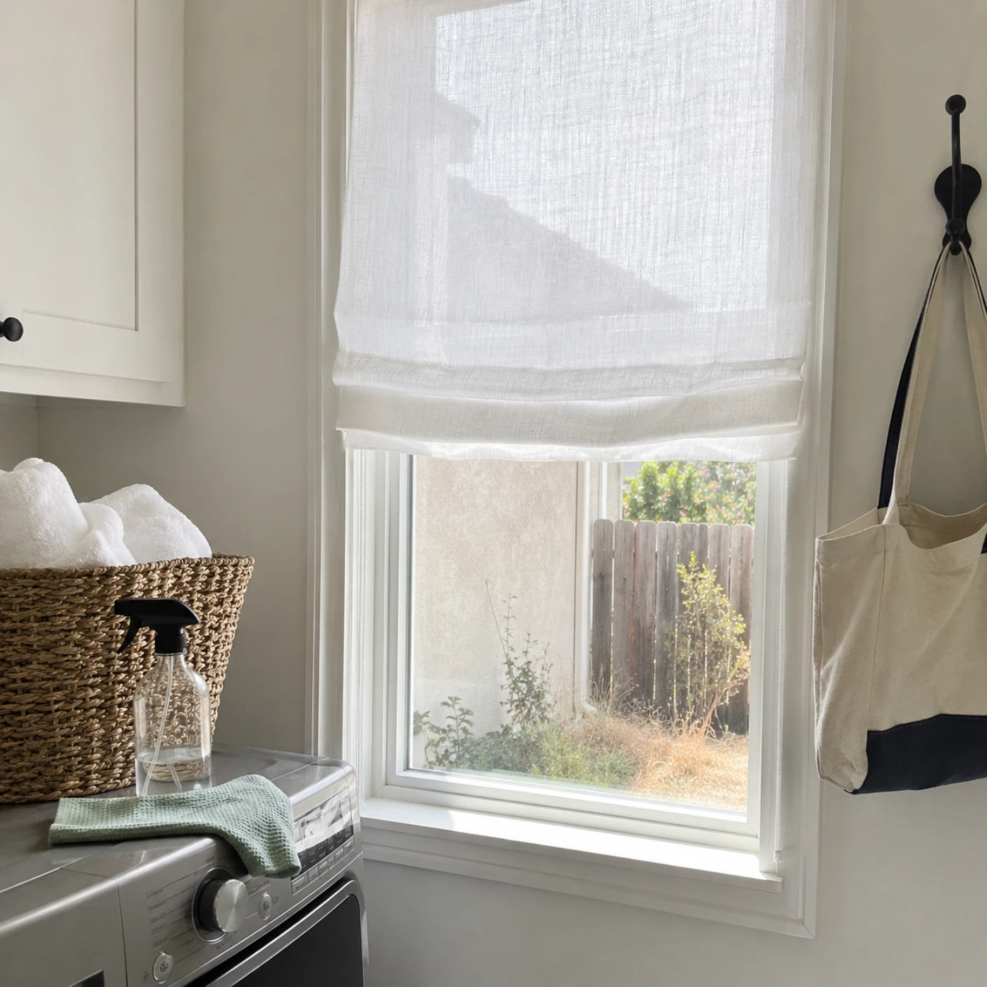 Custom Light Filtering Roman Shade in a real California family home by Fredesigner