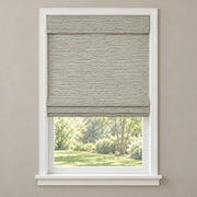 Pale Gray woven Roman shade D3902 mounted inside a white window frame