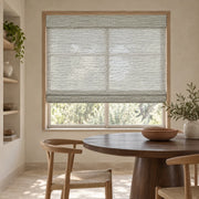 Pale Gray woven Roman shade D3902 in a sunlit room