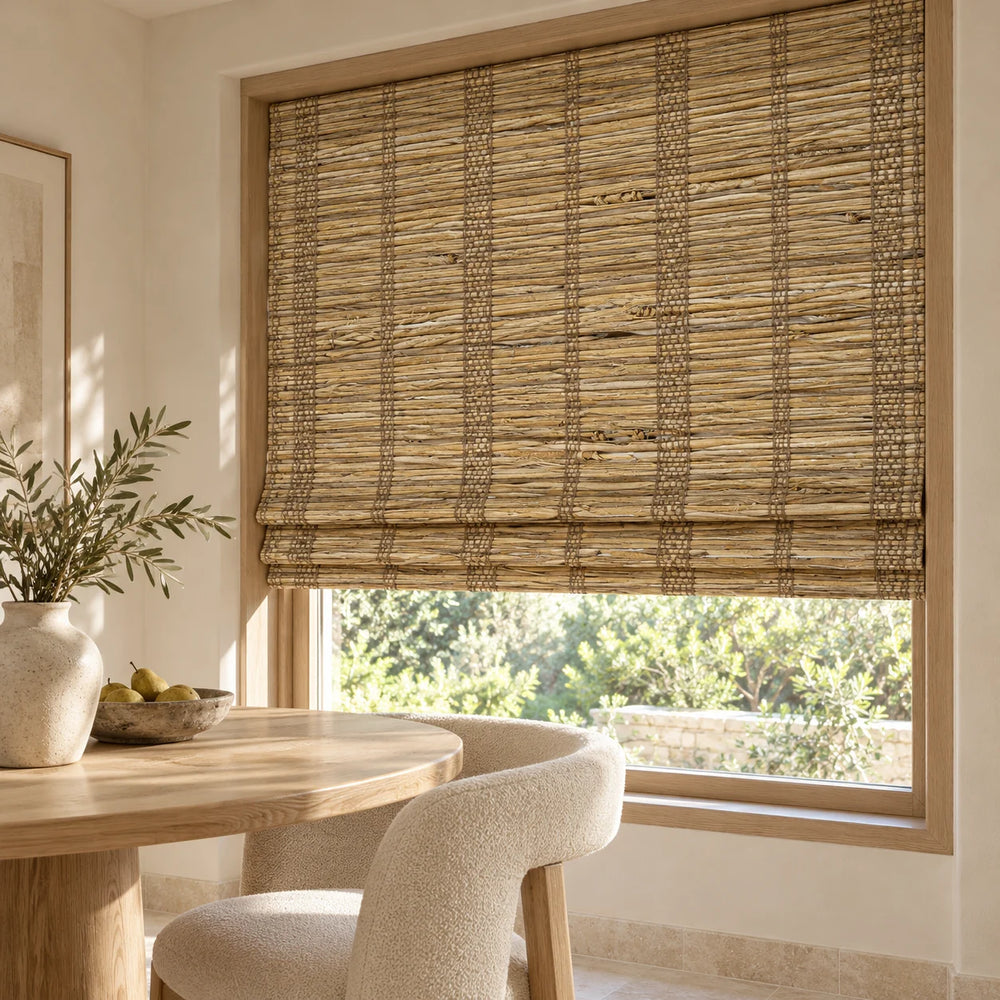 Golden Straw woven Roman shade D833 mounted inside a white window frame