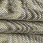 Close-up of the DU22 gray-green fine basket weave on the folds of a woven Roman shade