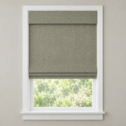 Gray Green woven Roman shade DU22 mounted inside a white window frame