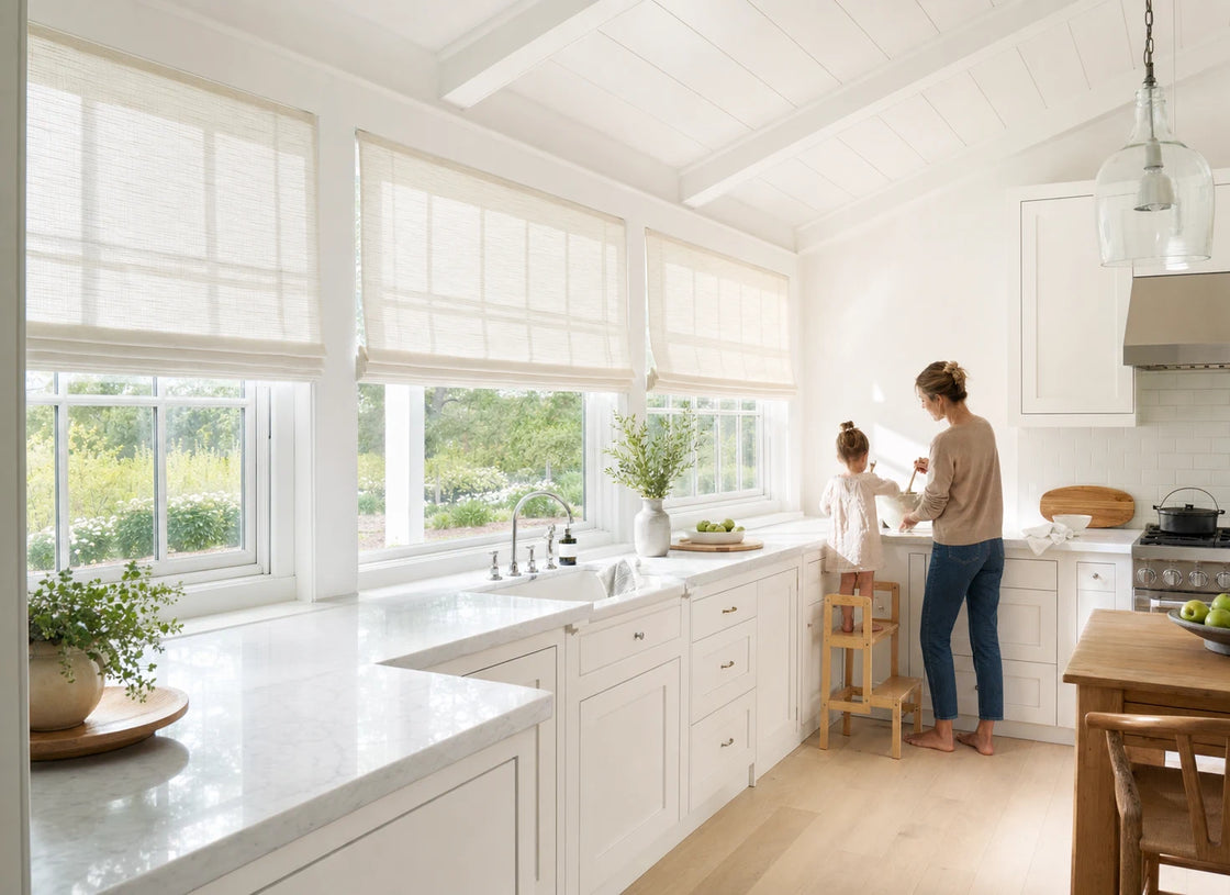 Light filtering roman shades in a lived-in California kitchen dining room