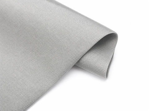 Polyester fabric draped to show its fine even weave