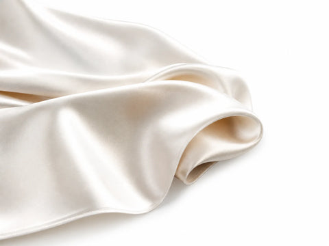 Silk fabric draped to show its smooth natural luster