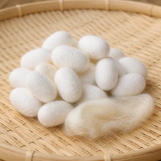 Natural white silk cocoons and raw silk fiber