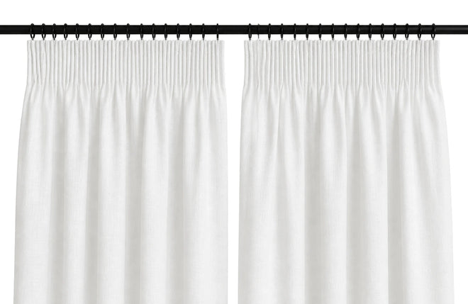 Pencil Pleat curtains shown across a window